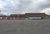 A wide angle view of the rear parking lot at the former KHS Keyser High School located in Keyser, WV.